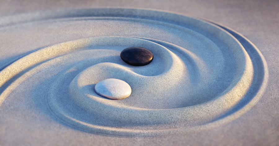 rocks and sand used to make a yin yang