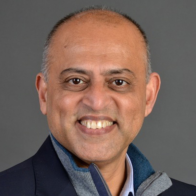 headshot of Naushad Merchant