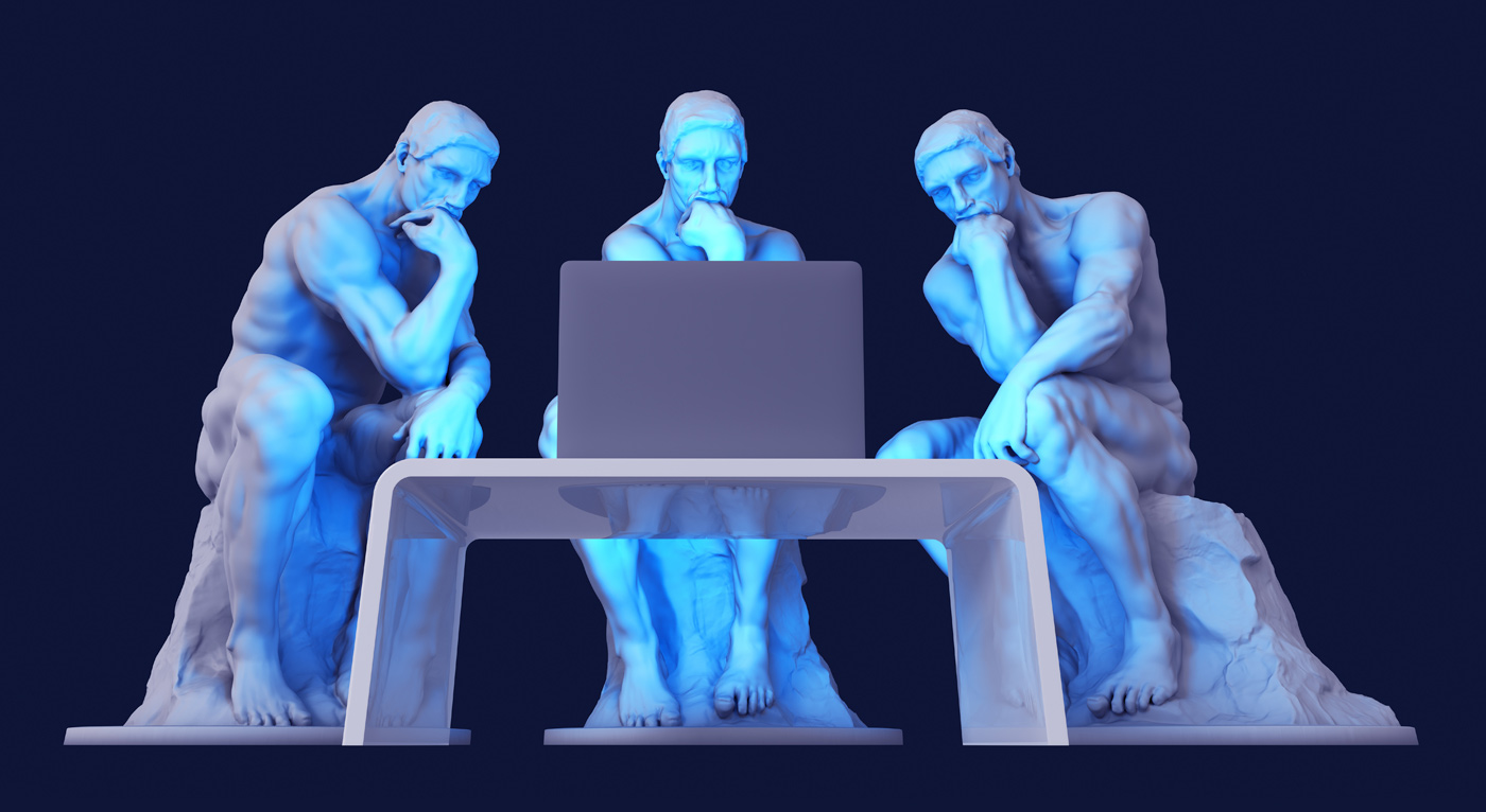 thinking statues around a laptop