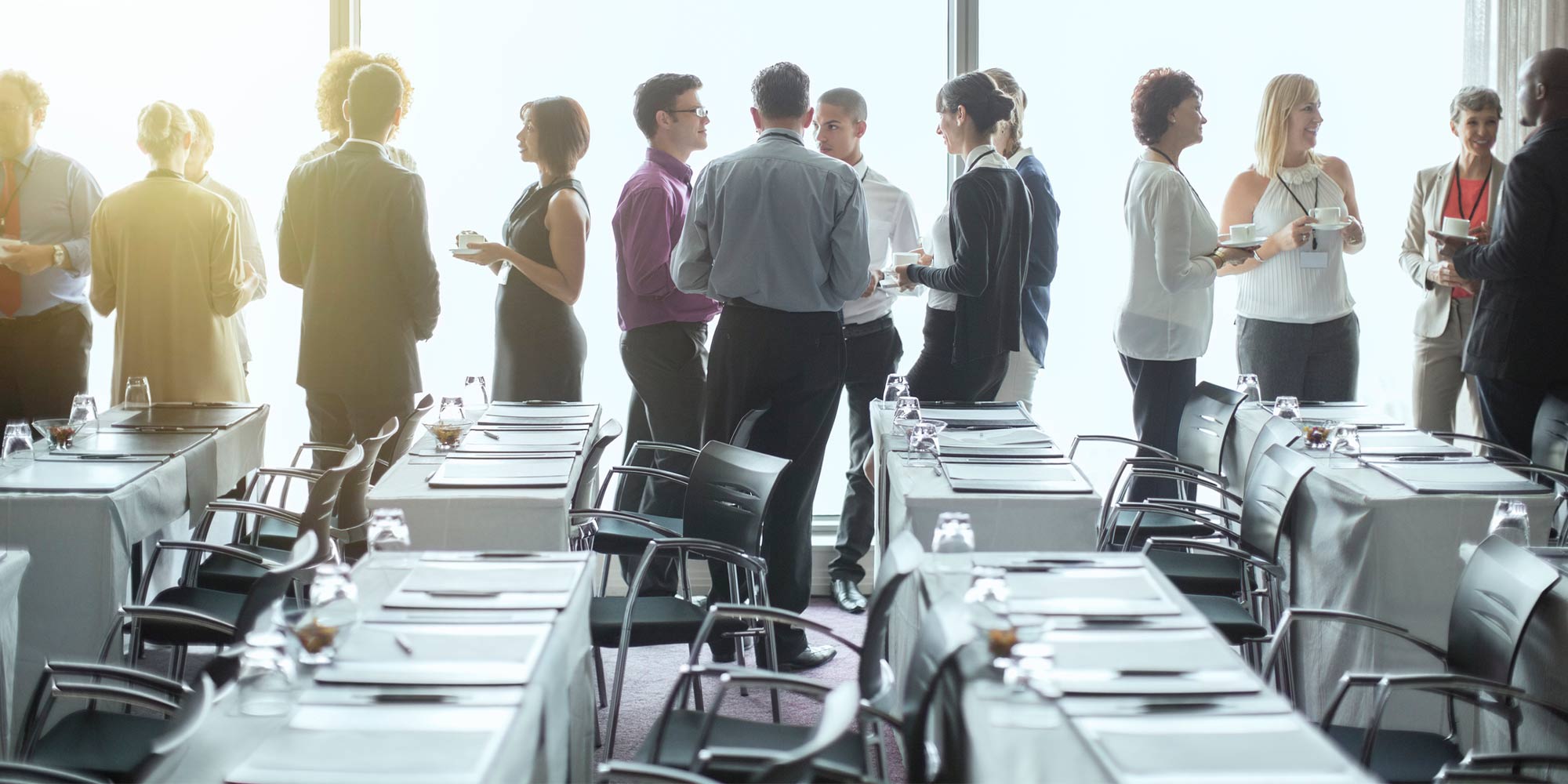 People standing by a window