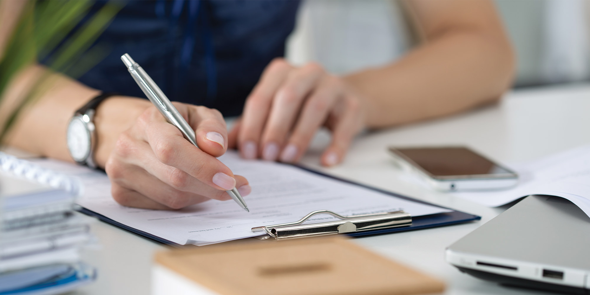 woman filling out application