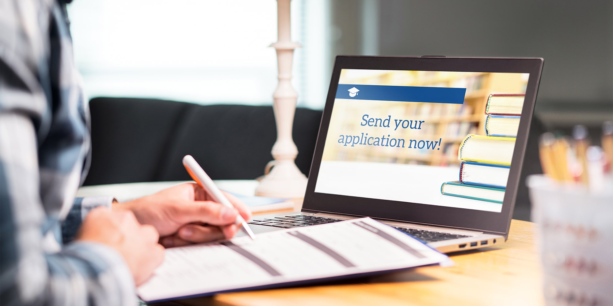 person on computer with application on screen