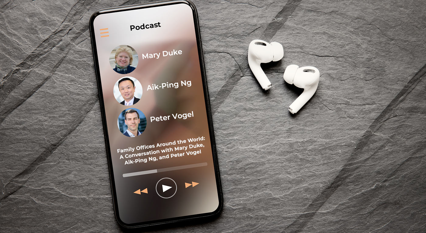 Music player on screen of mobile phone and wireless earphones on dark background
