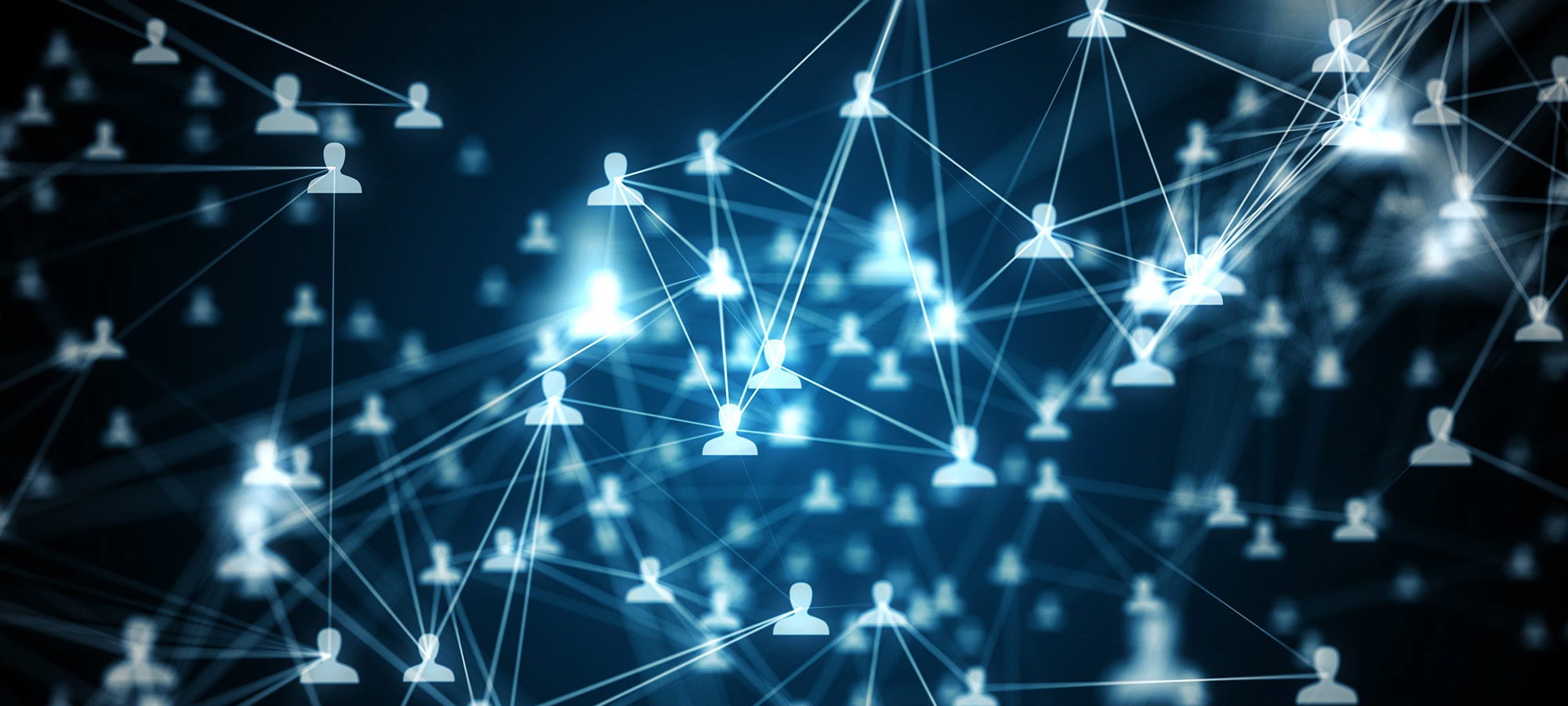 A digital 3D visualization of a global network showing glowing blue human icons connected by a complex web of light-speed data lines against a dark background