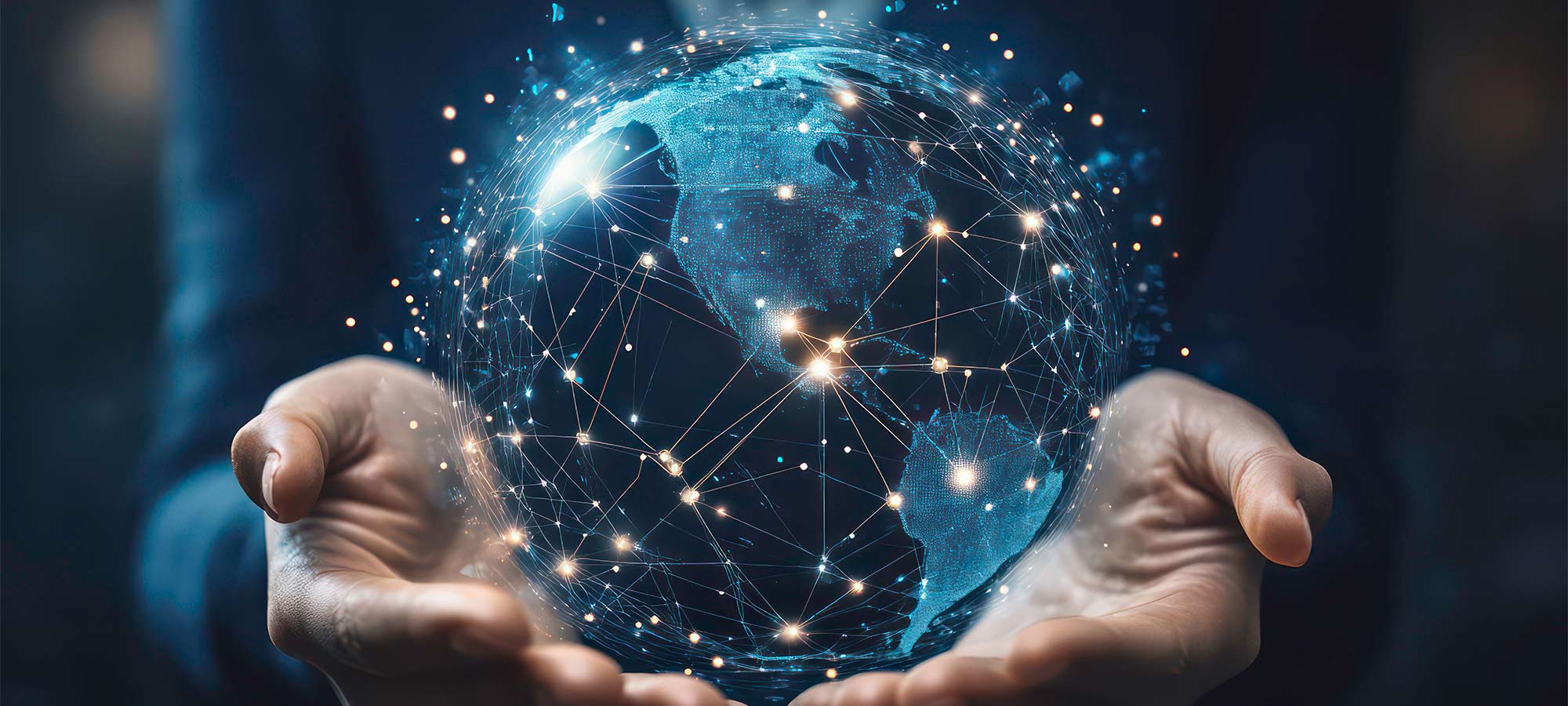 A pair of hands holding a glowing, translucent blue digital globe with a network of light points and connecting lines across the continents, symbolizing global connectivity.