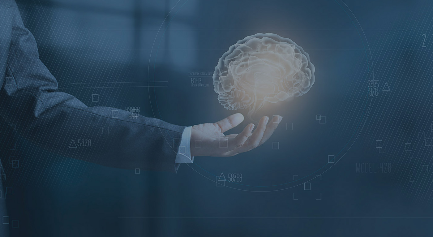 digital brain hovering above a hand